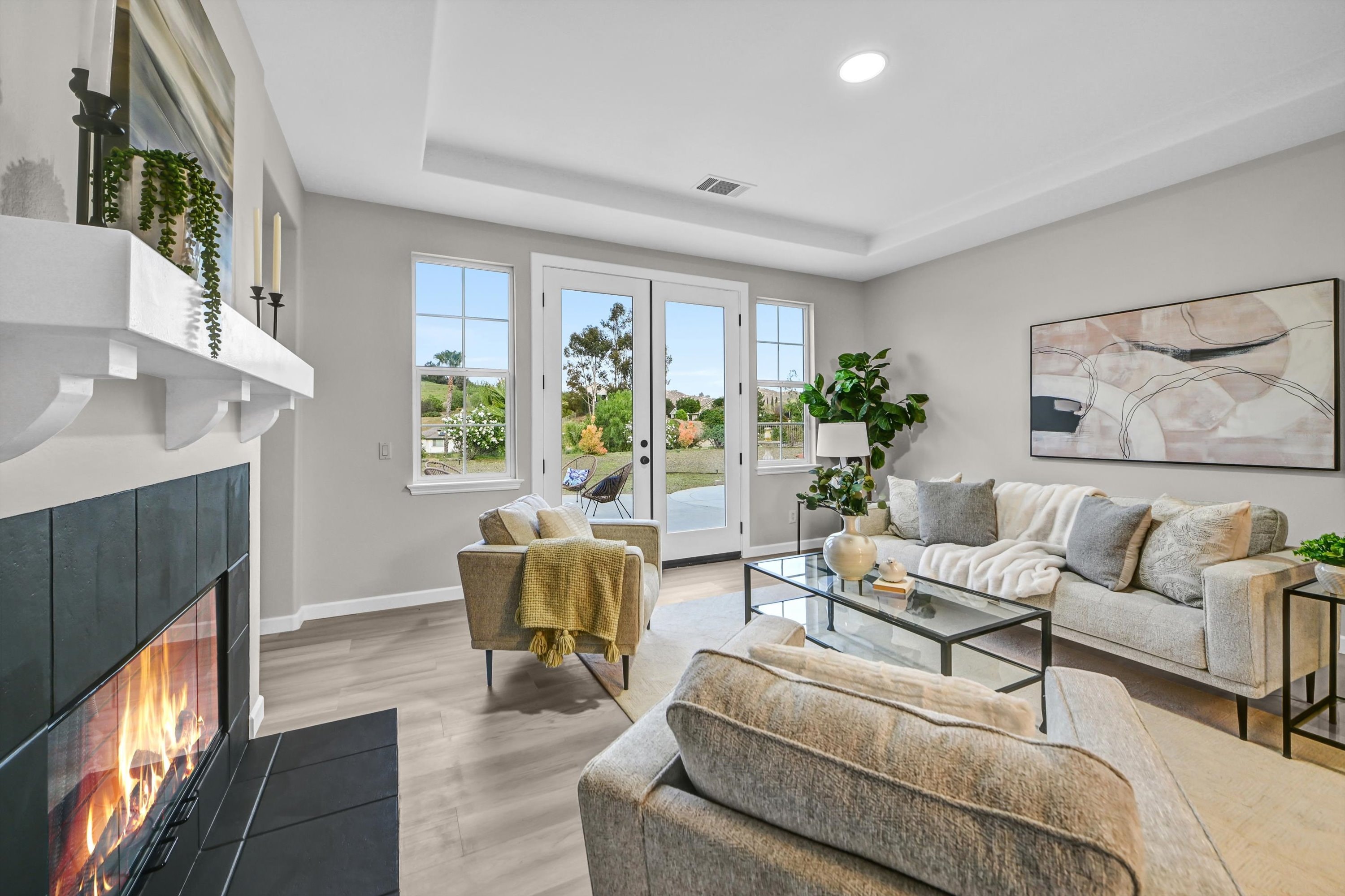Luxury kitchen island with quartz countertops and open living space