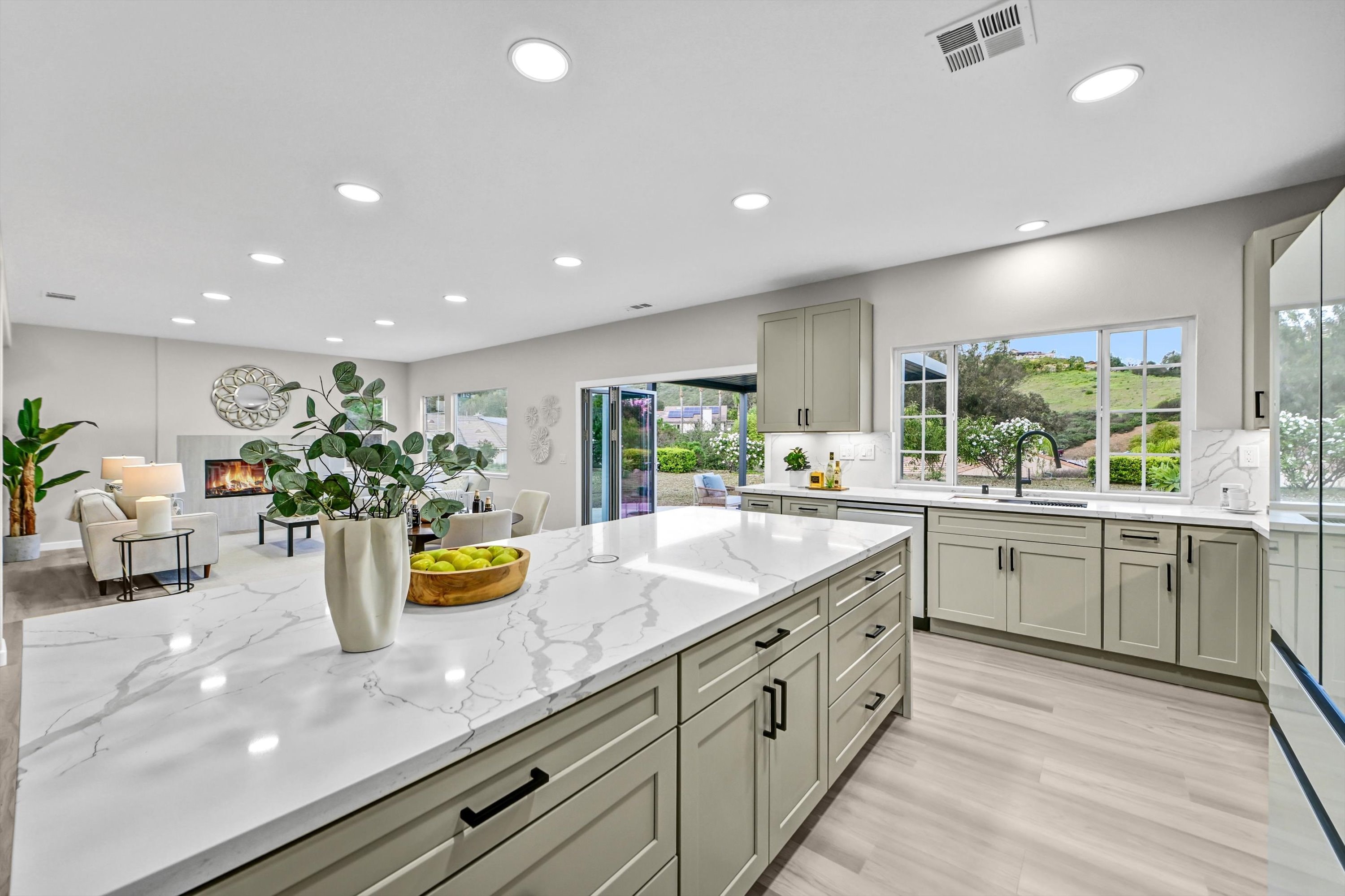 Full kitchen renovation with custom cabinetry and wet bar