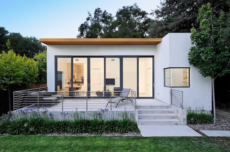 Modern ADU exterior with deck and large glass doors — Palo Alto